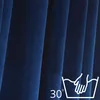 A close-up of dark blue velvet curtains with a washing instruction icon. Anteprima dell’immagine prodotto