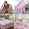 A collage of four images showing a unicorn-themed blanket in different settings. Náhľad obrázku produktu