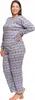 A woman is posing in a grey Christmas-themed pajama set. Produktbild-Vorschau