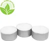 Three white tea lights in silver holders are arranged on a white background, with a green leaf logo in the top left corner. Podgląd zdjęcia produktu