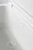 A close-up view of the interior of a white bathtub, showing the drain and overflow fittings. Produktbild-Vorschau