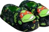 A pair of children's slippers featuring Teenage Mutant Ninja Turtles characters. Náhled obrázku produktu