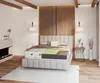 A cutaway view of a mattress on a bed in a bedroom. Produktbild-Vorschau