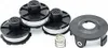 A set of three trimmer spools with string and a separate spool cover and spring, arranged on a white background. Produktbild-Vorschau