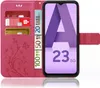 A pink flip case for a Samsung Galaxy A23 5G phone, showing credit cards and euro banknotes inserted into the case. Produktbild-Vorschau