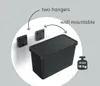 A black storage bin is shown with wall mounting hardware and a weight limit indicator. Náhľad obrázku produktu