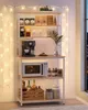 A white and wood shelving unit filled with kitchen items like a coffee maker, microwave, bottles, and jars. It is decorated with fairy lights. Náhled obrázku produktu