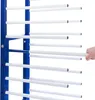 A close-up view of a drying rack with multiple white bars, and a hand reaching for one of the bars. Anteprima dell’immagine prodotto