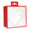 A white USB-C charger is displayed in its red and white retail packaging. Voir les images du produit