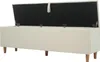 A beige upholstered storage bench with its lid open, revealing the black interior. Anteprima dell’immagine prodotto