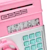 Close-up of a pink electronic piggy bank with a keypad and slots for money. Náhľad obrázku produktu