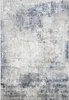 A flat lay of a rug with an abstract, distressed pattern. Produktbild-Vorschau