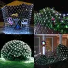 Collage of four images showing white net lights decorating outdoor spaces like a patio, bushes, and a garden. Produktbild-Vorschau