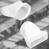 Two white plastic duct connectors are shown against a blurred background of industrial ductwork. Voir les images du produit