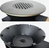 Two close-up views of a black fire pit with a metal grill and a circular lid with ventilation holes. Produktbild-Vorschau