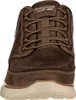 A close-up front view of a brown Skechers slip-in boot. Náhled obrázku produktu