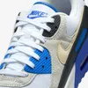 A close-up view of the front of a Nike Air Max 90 sneaker. Produktbild-Vorschau