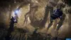 Three characters are fighting a giant spider-like creature in a forest. Produktbild-Vorschau