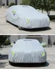 Two images of a car covered with a gray protective cover, parked outdoors. Produktbild-Vorschau