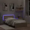 A bedroom scene with a bed, nightstand, and wall art. Produktbild-Vorschau