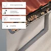 A close-up view of a gutter guard system installed on a roof, with descriptive text boxes highlighting product features. Produktbild-Vorschau