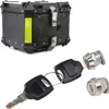 A motorcycle top box and its associated lock cylinder and keys are displayed against a white background. Produktbild-Vorschau