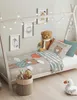 A child's bed with teddy bear themed bedding and decorations. Náhled obrázku produktu