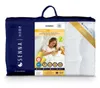 The image shows the packaging of a duvet, with a woman in the background. Podgląd zdjęcia produktu