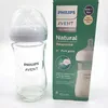 A Philips Avent glass baby bottle and its packaging are shown against a white background. Podgląd zdjęcia produktu