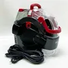 A portable carpet cleaner with its power cord coiled in front. Voir les images du produit