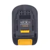 The back of a black and yellow battery adapter is shown against a white background. Produktbild-Vorschau