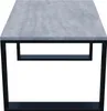 A product shot of a coffee table with a concrete-look top and black metal legs. Produktbild-Vorschau