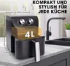 An air fryer is shown on a kitchen counter next to a sink and faucet. Dimensions and capacity are indicated with text overlays. Produktbild-Vorschau