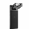 A black Google Pixel 8 Pro phone with camera lens protectors shown above it. Produktbild-Vorschau