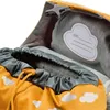 Close-up view of the interior of a backpack, showing a drawstring closure and a name tag. Anteprima dell’immagine prodotto
