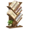 A wooden tree-shaped bookshelf filled with books and a small potted plant. Náhled obrázku produktu