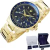 A gold Maserati Sfida Chrono watch with a blue dial, presented with its original packaging. Produktbild-Vorschau