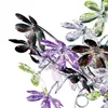 A close-up view of a decorative lamp with crystal-like flowers in various colors. Náhled obrázku produktu