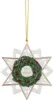 A Christmas ornament shaped like a star with a wreath in the center. Náhľad obrázku produktu