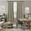 A well-decorated living room or home office with a desk, sofa, coffee table, and curtains. Náhled obrázku produktu