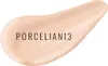A swatch of foundation makeup with text on it. Voir les images du produit