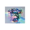 A tangled string of multicolored LED lights on a reflective surface. Voir les images du produit