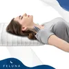 A woman is lying on a pillow, with a graphic overlay on her neck indicating support. Produktbild-Vorschau