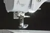 Close-up of a sewing machine needle and presser foot Náhľad obrázku produktu