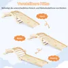 Three different configurations of a wooden climbing arch and slide set for children, labeled with height settings. Produktbild-Vorschau