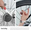A split image showing two different bicycle maintenance tasks being performed. Produktbild-Vorschau