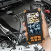 A hand holds an endoscope camera in front of a car engine. Produktbild-Vorschau