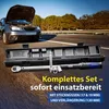 A car with its hood open on the side of a road, with a tool kit in the foreground. Anteprima dell’immagine prodotto