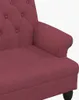 A close-up view of a burgundy upholstered bench with tufted detailing on the backrest and a rolled armrest. Produktbild-Vorschau