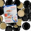 A collection of black and beige jar lids with a promotional flyer for jam. Produktbild-Vorschau